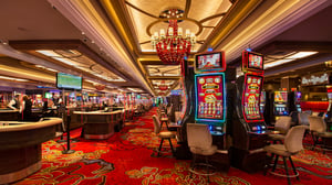 GSR casino floor view of table games and slots.