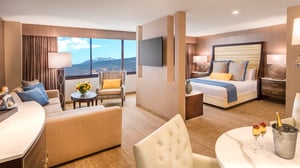 The A Executive Suite view of dining lounge and bedroom areas.