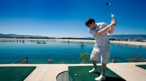 Young-man-takes-a-swing-at-Grand-Bay-Aqua-Range_lut1